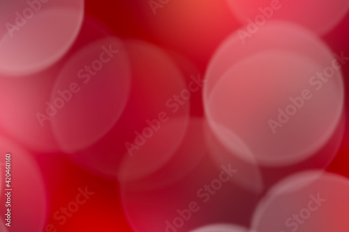 Red bokeh background. Red blurred background.
