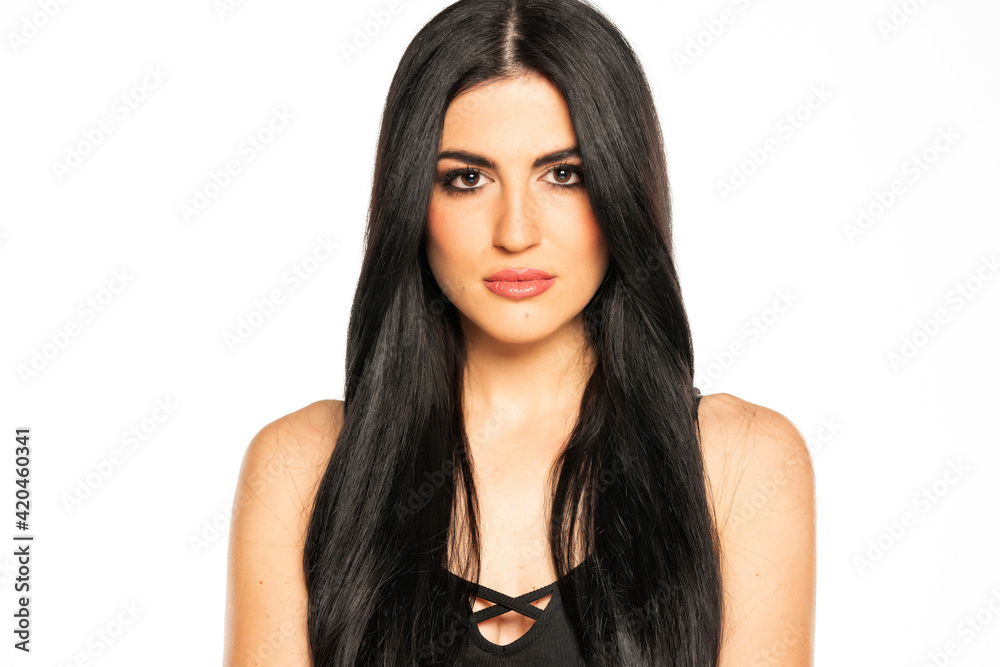 Beautiful young woman with long black hair and makeup Beautiful young woman with long black hair and makeup