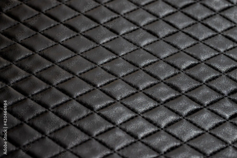 genuine leather with black rhombic stitching background and texture. black diamond leather pattern of seat sofa. genuine leather with black rhombic stitching background and texture. black diamond leather pattern of seat sofa.