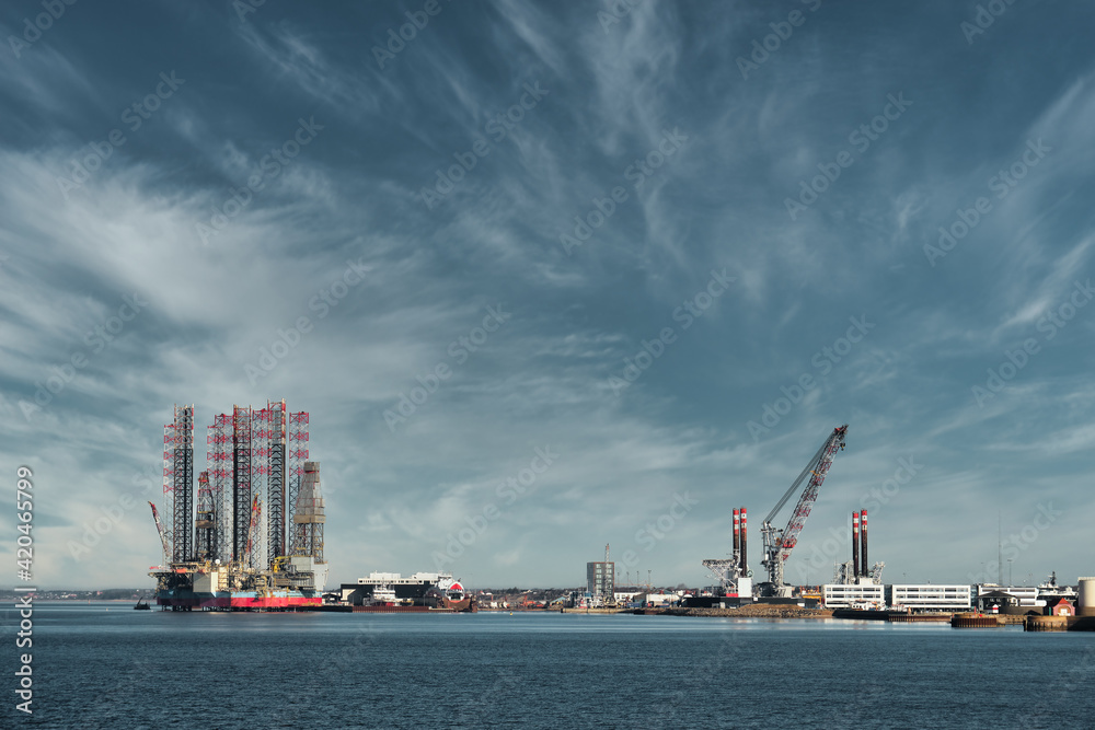 Oil and Wind power rigs in Esbjerg harbor. Denmark Oil and Wind power rigs in Esbjerg harbor. Denmark