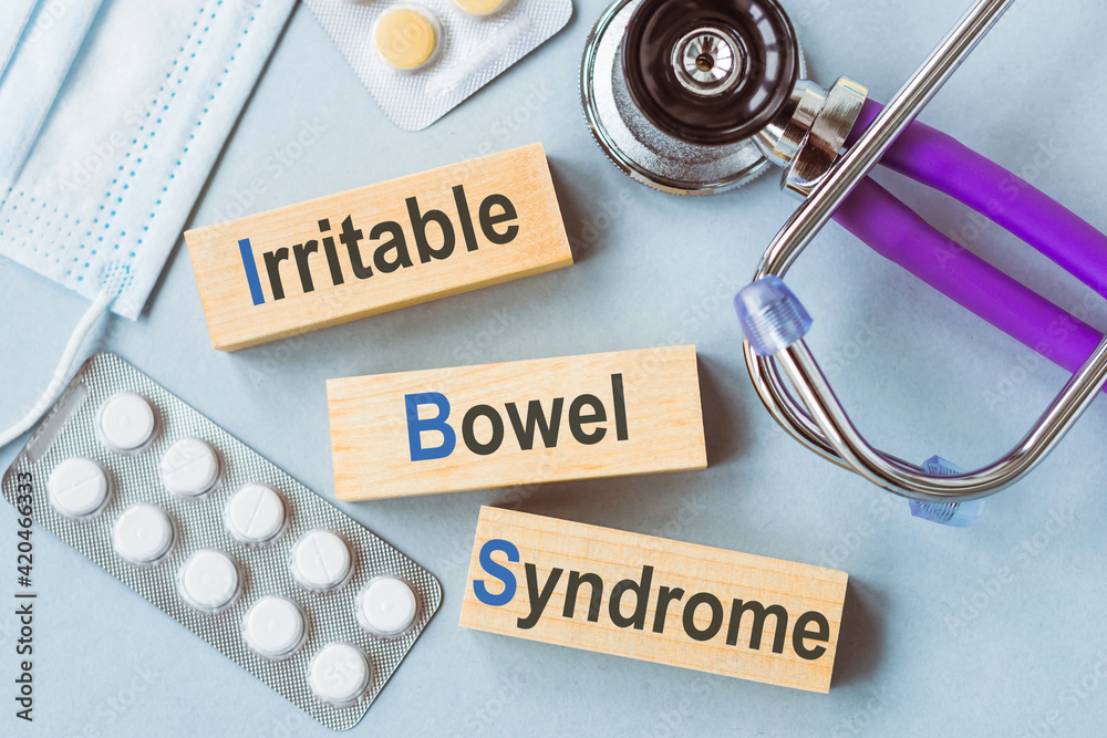IBS - Irritable Bowel Syndrome, words on wooden blocks. Medical concept. IBS - Irritable Bowel Syndrome, words on wooden blocks. Medical concept.