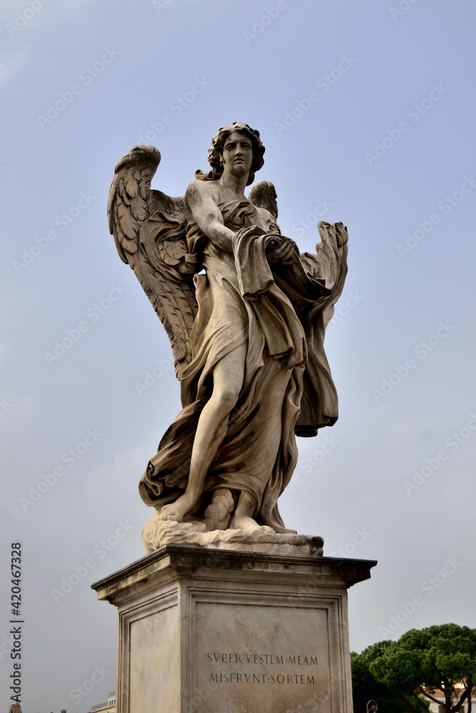 angel statue at Aelius bridge (Ponte Saint'Angelo) over the river Tiber - Rome, Italy