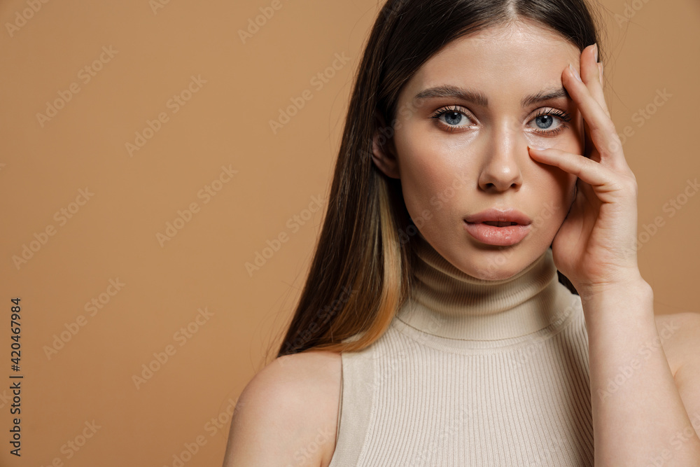 Pretty woman with long straight brown hair posing Pretty woman with long straight brown hair posing