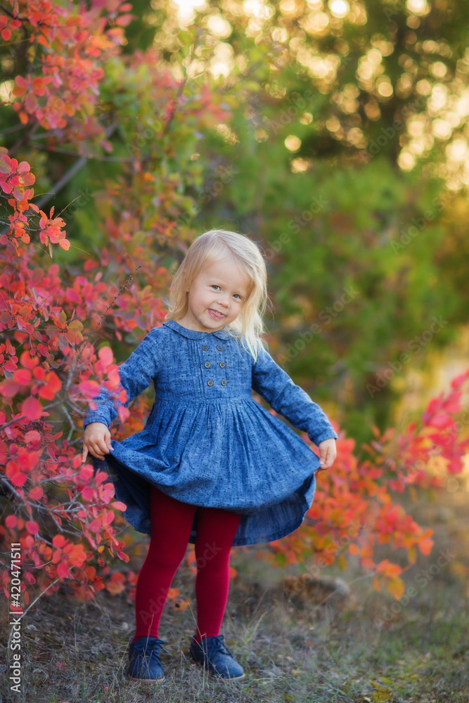 Cute little girl having fun outdoor. Girl portrait in park. Cute little girl having fun outdoor. Girl portrait in park.