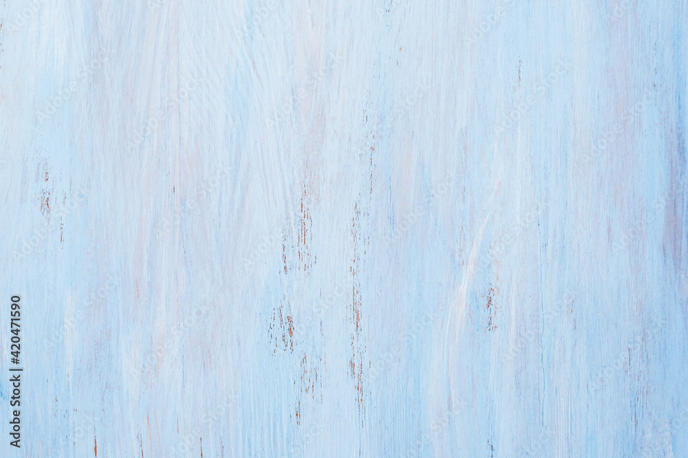 Obraz premium Subtle empty light blue wooden backdrop.