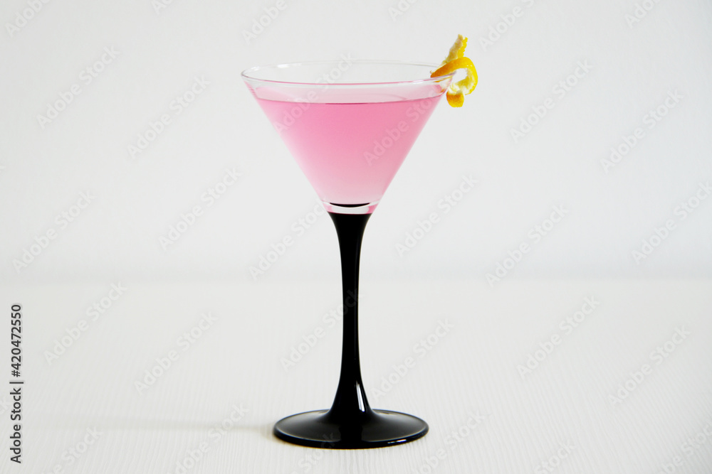cosmopolitan cocktail with lemon peel