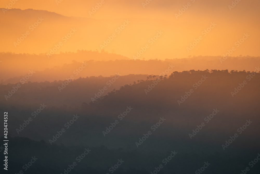 nature landscape view, mountain layers with sunset or sunrise with cloud sky, concept of summer travel in vacation and relaxation, morning scene in the tropical forest, nature background