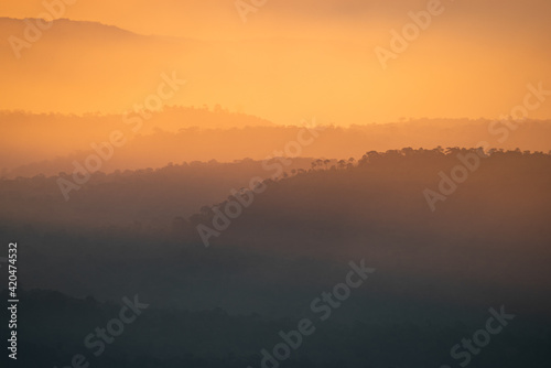nature landscape view, mountain layers with sunset or sunrise with cloud sky, concept of summer travel in vacation and relaxation, morning scene in the tropical forest, nature background