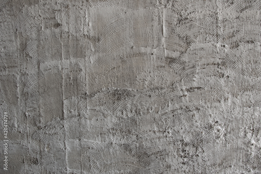 Texture of fresh concrete wall on construction site, fresh plastered cement wall.Gray blank cement textured or plaster wall abstract art pattern texture for background creative work with copy space