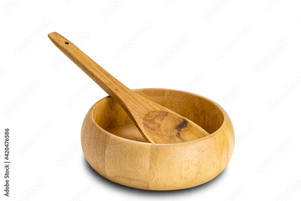 Side view of wooden spoon and wooden bowl on white background. Side view of wooden spoon and wooden bowl on white background.
