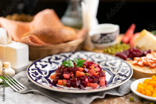 Vegan vegetable salad vinaigrette with beetroot  green peas and boiled potatoes