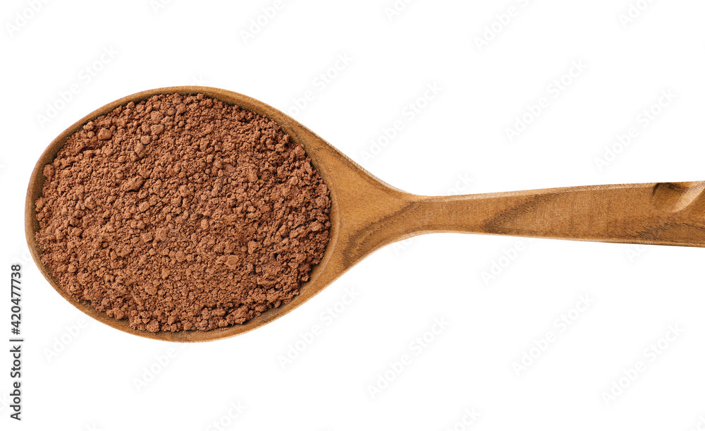 Wooden spoon with cocoa powder isolated on white background. Wooden spoon with cocoa powder isolated on white background.