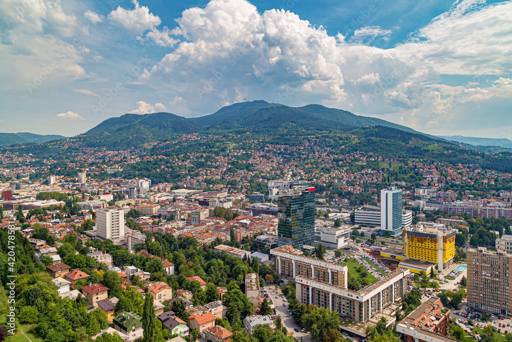 Panorama of the urban districts of Sarajevo, the capital of Bosnia and Herzegovina, and the mountains surrounding the valley of river Miljacka 