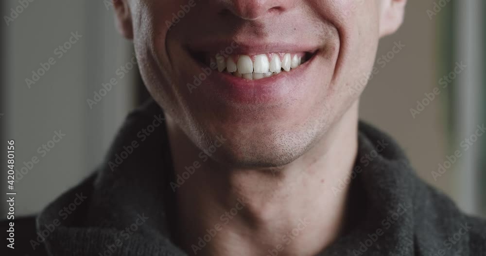 Close-up portrait mouth of a shocked man with sudden good news rejoices at a successful win and feels happy. Close-up portrait mouth of a shocked man with sudden good news rejoices at a successful win and feels happy.
