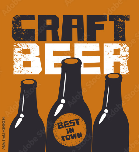 Banner for a best craft beer in town. Vector illustration in a grunge style with inscriptions and three black bottles on a brown background