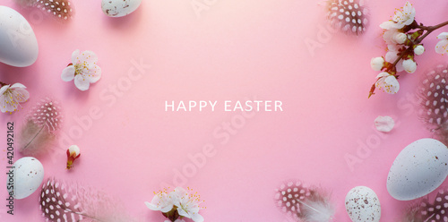 Art Happy Easter Holiday banner or greeting card background with Easter eggs and Spring Flowers