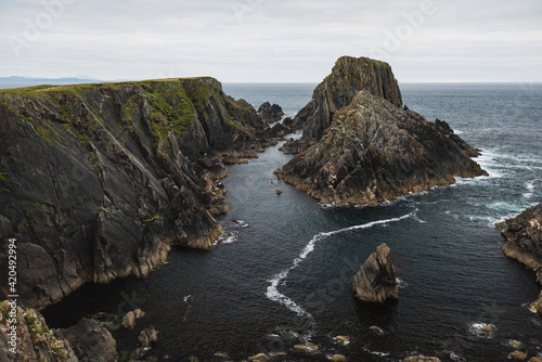 Landscape of cliffs and rocks with the sea in the background