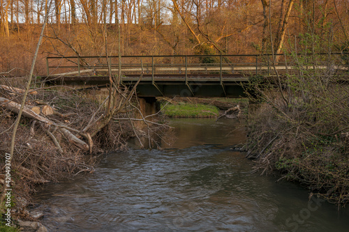 Railway bridge leading the Angertalbahn (Kalkbahn) over the Angerbach near Ratingen, North Rhine-Westphalia, Germany photo