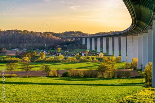 Evening view over the Ruhrtal and the motorway bridge towards towards Mintard in Muelheim an der Ruhr, North Rhine-Westphalia, Germany photo