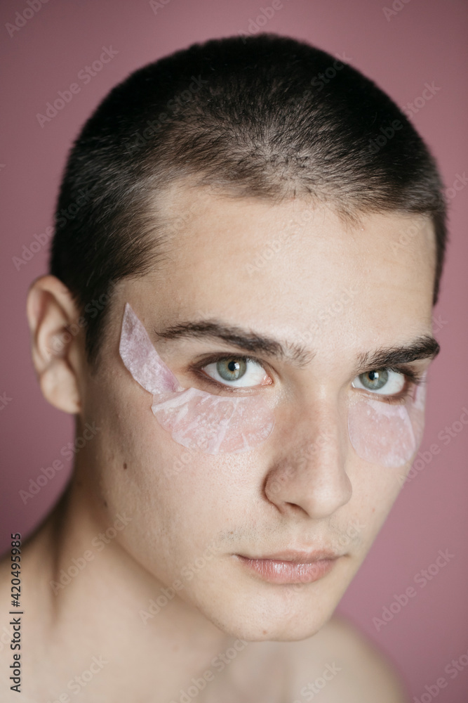 Portrait Of Young Man With Petal Composition On The Face