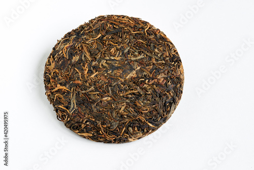 Tableau sur toile Chinese pressed pu er tea on white background  close-up