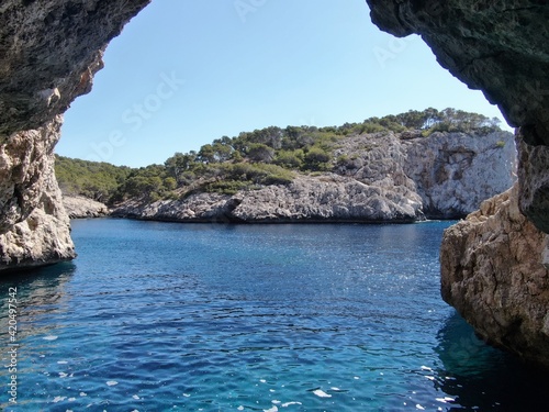 seacoast of mallorca with beaturiful view of the sea with crystalclear water. Sea view of turquoise colour. Concept of summer, travel, relax and enjoy photo