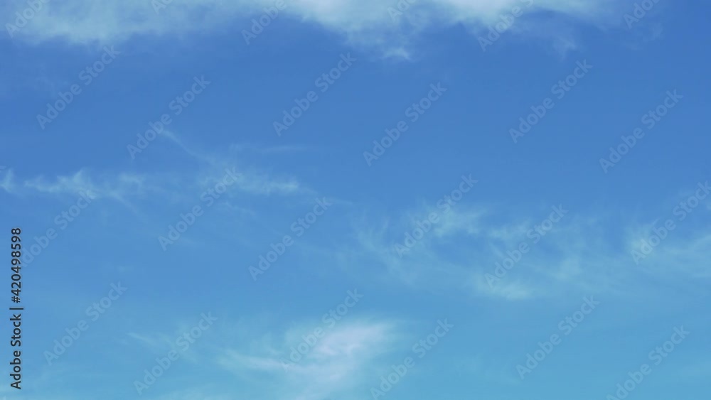 Light Gentle Clouds in a Light Blue Sky, Time Lapse. Clear Sky during The Day with Cirrus Clouds. Background of Light Clouds and Sky in Wonderful Weather. Light Gentle Clouds in a Light Blue Sky, Time Lapse. Clear Sky during The Day with Cirrus Clouds. Background of Light Clouds and Sky in Wonderful Weather.