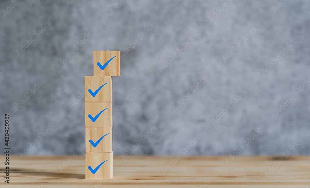 Object on the table of icon sign checklist on wooden block stacking ...