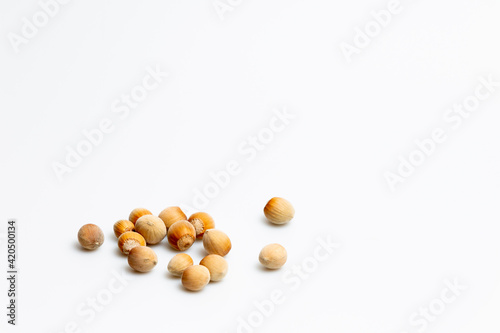 hazelnuts isolated on white background © LilianC