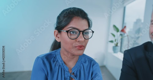 Indian businesswoman speaking in a meeting  photo