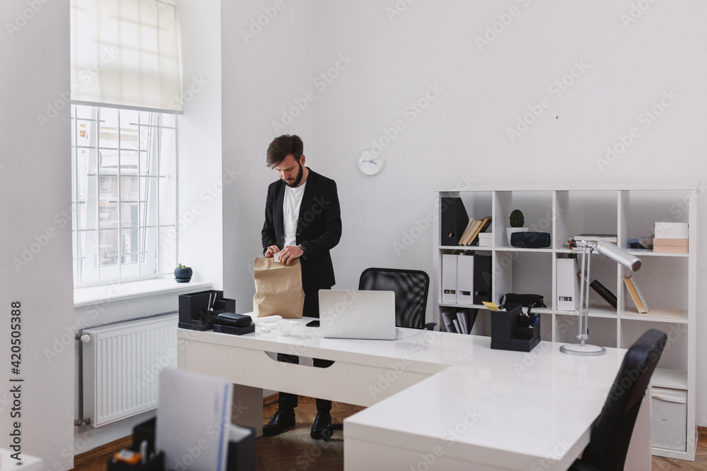 Man ordering dishes from delivery services Man ordering dishes from delivery services