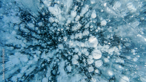 Methane Bubbles in Ice at Baikal Lake in Russia in Winter