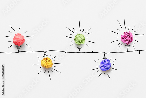 Paper crumpled bulbs on a drawn garland.