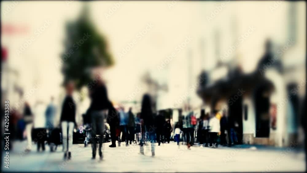 Crowd of anonymous people walking on busy city street Crowd of anonymous people walking on busy city street