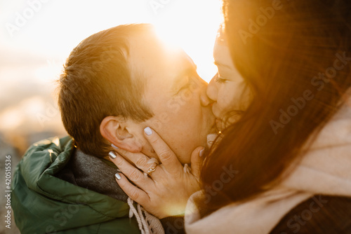 tender kiss in sunset light