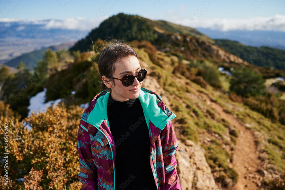 Female traveler in autumn mountains Female traveler in autumn mountains