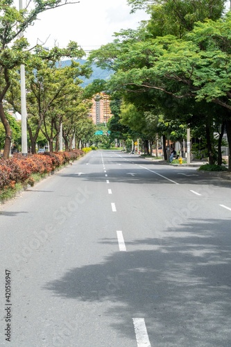 Medellin, Antioquia, Colombia. July 20, 2020:  33rd Avenue and green corridors of the city. photo