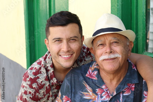 фотографія Single Hispanic mature father with only one adult son