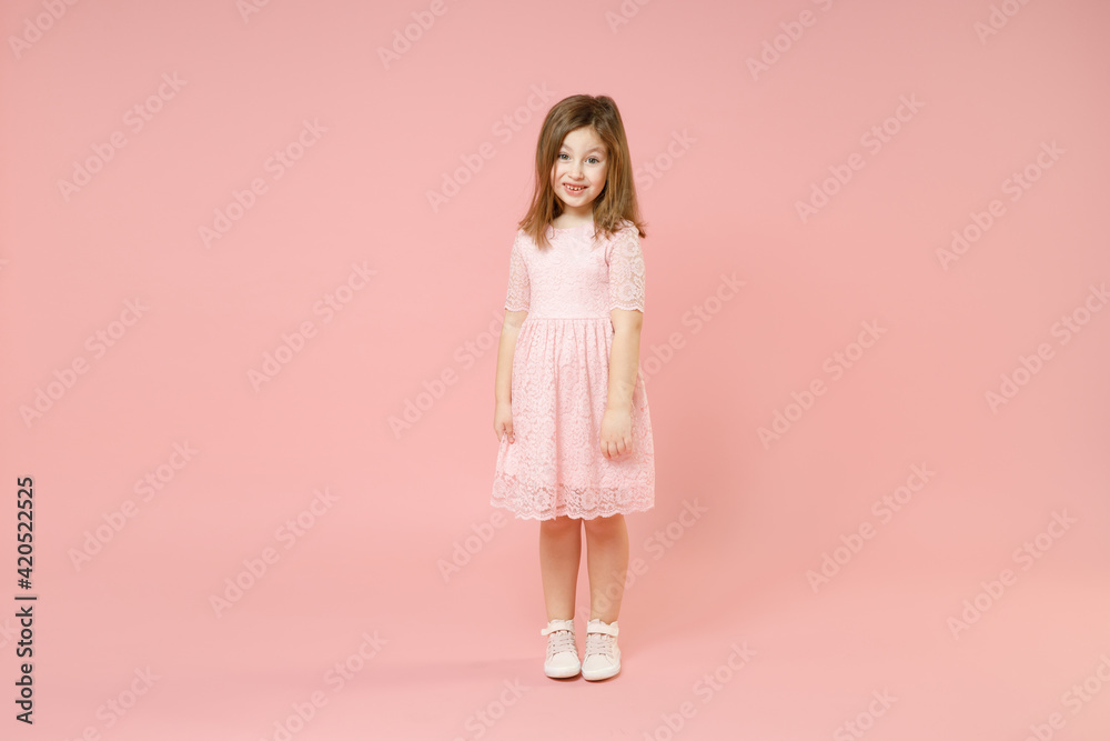 Full length little cute kid girl 5-6 years old wears rosy dress have ...
