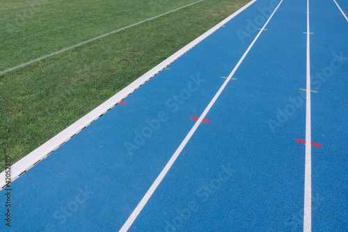 Blue Race Tracks In Sport Stadium
