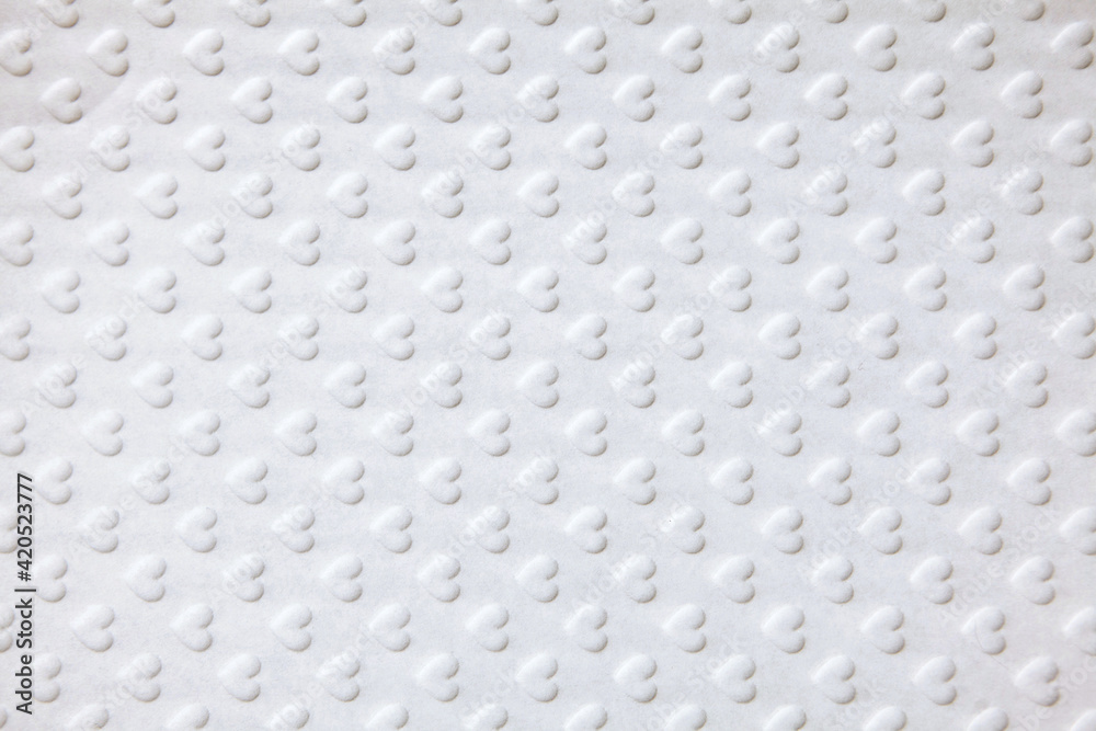 Naklejka premium White background with textured hearts. The concept of Valentine's Day. Holiday background