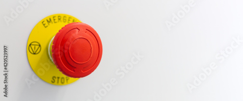 The red button of machine emergency stop. Banner format.