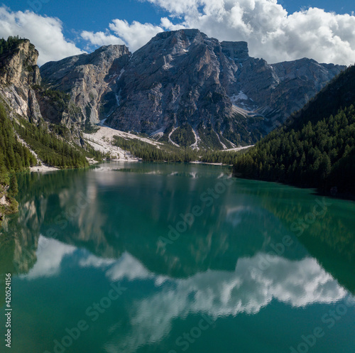 Aerial view of the Lake Braies, Pragser Wildsee is a lake in the Prags Dolomites in South Tyrol, Italy. View of Croda del Becco mountain in the background