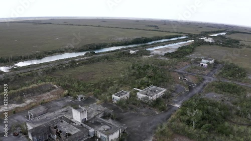 Rising up over the abandoned Aerojet rocket facility in the Florida Everglades, aerial photo