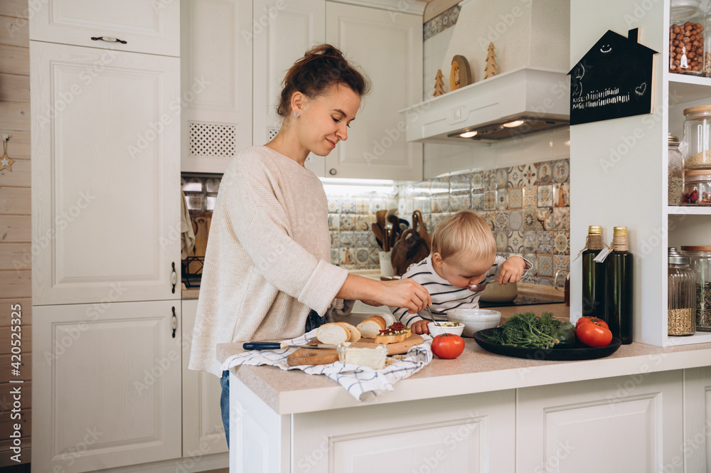 Mother and son cooking lunch in weekend Mother and son cooking lunch in weekend