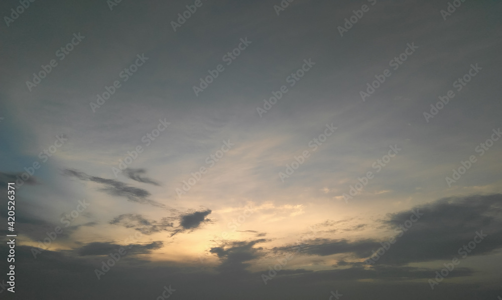 Sunset scenery view of clouds in blue sky background, weather conditions, nature photography Sunset scenery view of clouds in blue sky background, weather conditions, nature photography