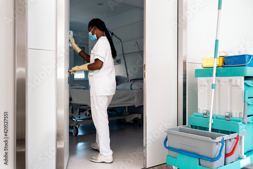 Cleaning Worker Disinfecting Hospital