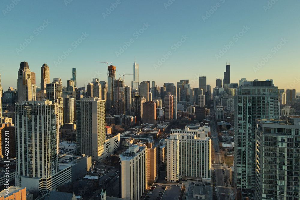 Chicago downtown aerial panorama view at sunset with skyscrapers and city skyline at Michigan lakefront with colorful cloud.