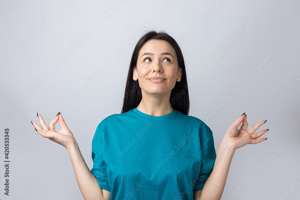 Smiling girl gesturing OK sign with her hand Smiling girl gesturing OK sign with her hand