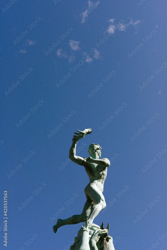 Brabo Statue 'throwing away his hand' in Antwerp, Belgium